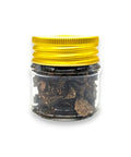 Black winter truffle spice jar with yellow lid, showcasing dried black winter truffle Tuber Brumale