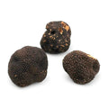 Fresh Autumn Truffle Tuber Uncinatum Burgundy Truffle with three black truffles