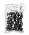 Vacuum-sealed bag of frozen autumn truffle Tuber Uncinatum C-grade for gourmet cooking